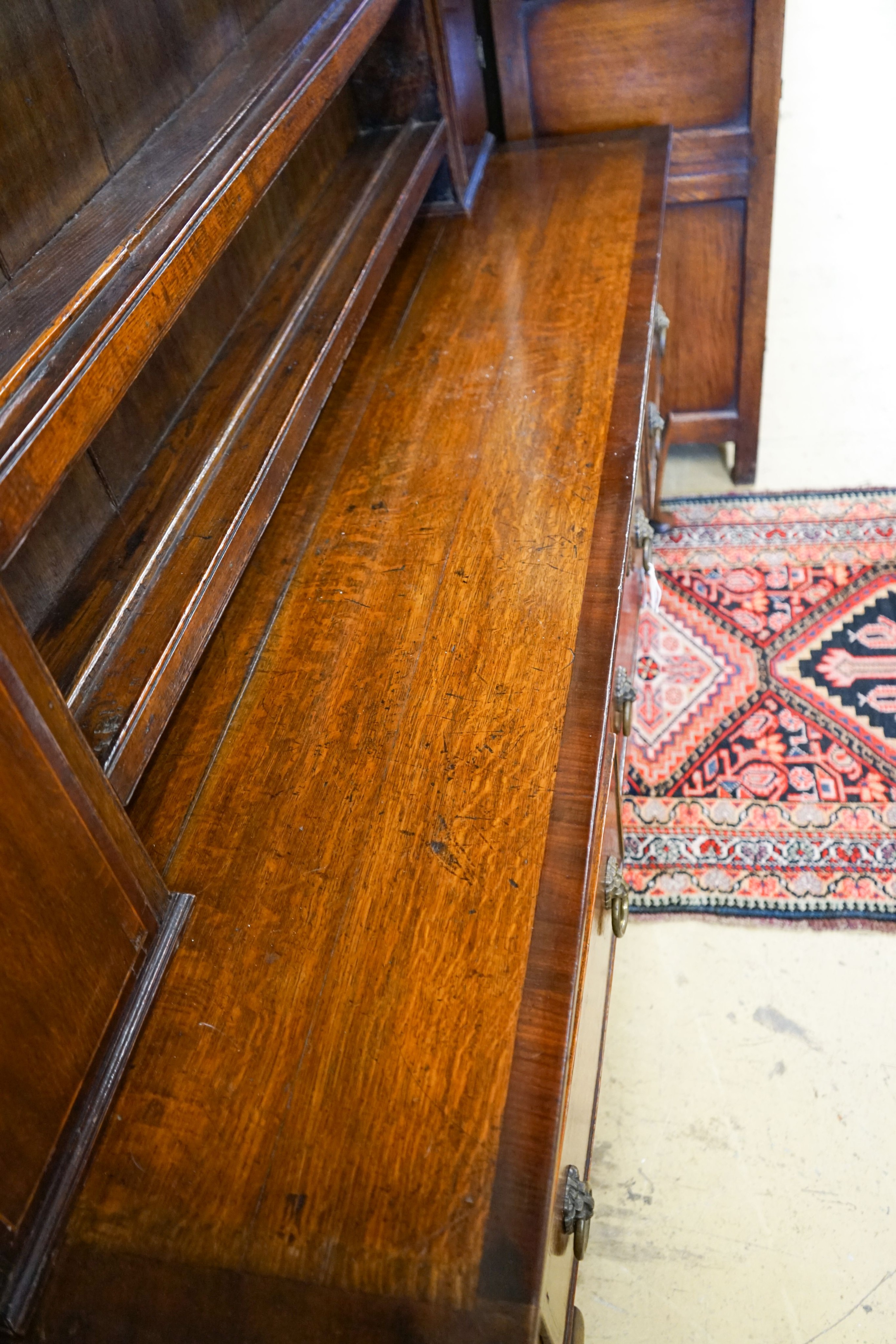 An 18th century oak and mahogany crossbanded dresser